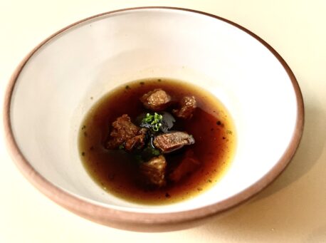 Inky lamb broth at Heft in High Newton which won a Michelin star in March 2023